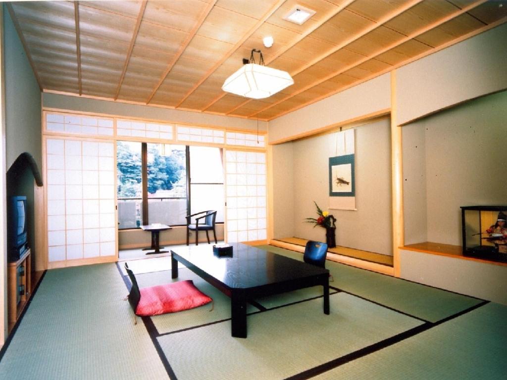 Отель Kadonobo Ryokan Кобе Экстерьер фото